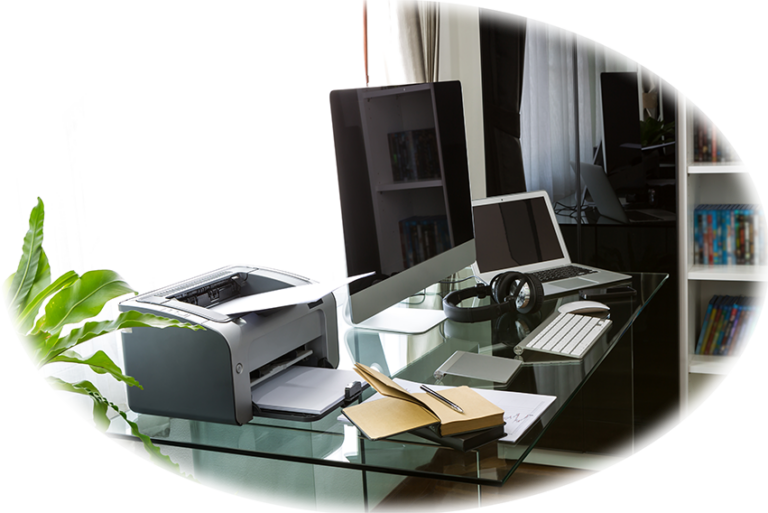 Office with computer glass table